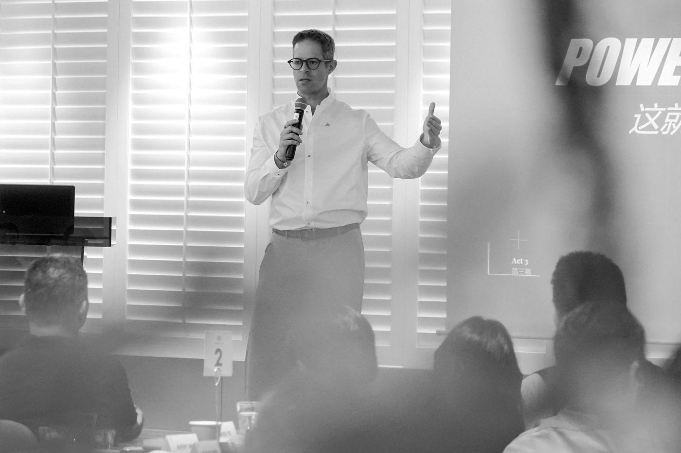 Salomon speaking to the room in Shanghai